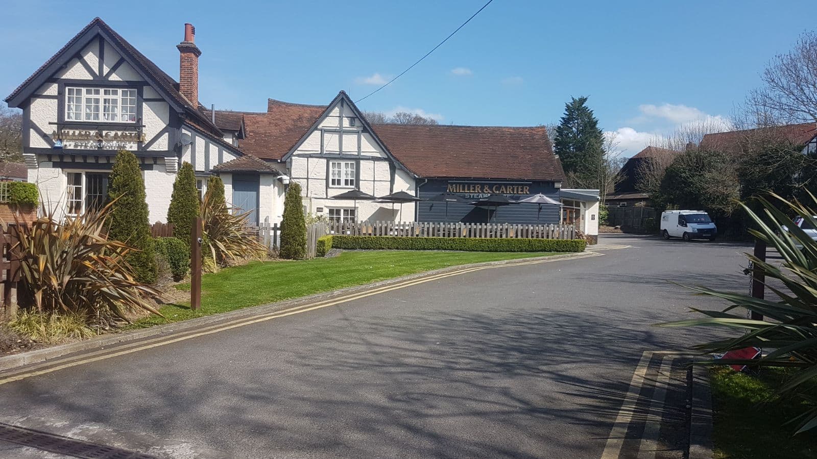 Lawns, borders and hedges we maintain outside a Tudor-style pub